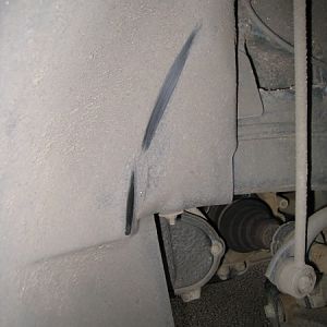 interferance with inner wheel arch cover at the front of the tyre on the nearside front wheel