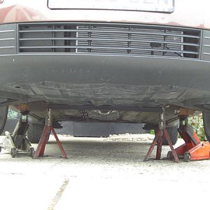 front view showing the front wheel spoilers and the undercar spoiler