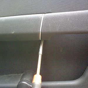 Screw under pull handle
