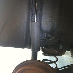 Rear Shock absorber cover loose
