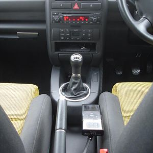 Belkin wireless FM transmitter for iPod
Very easy to use, next to the handbrake.