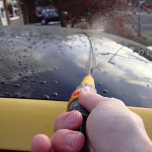 Having used some bathrrom foam to loosen any remaing dirt, a good clean with water, and another rub with the soapy brush was needed!